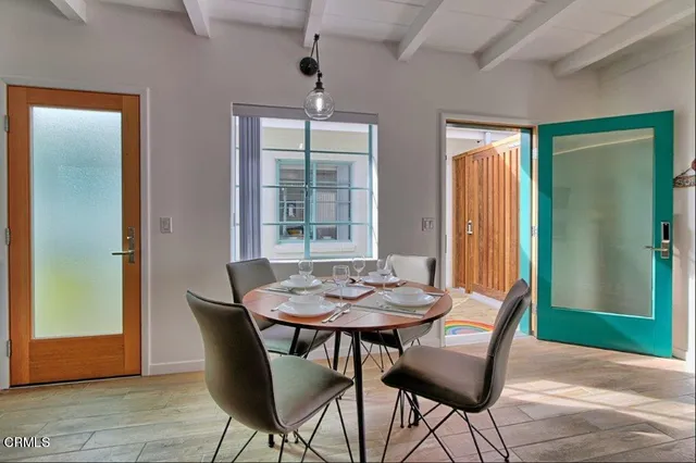 a kitchen with stainless steel appliances granite countertop a stove top oven a sink and dishwasher