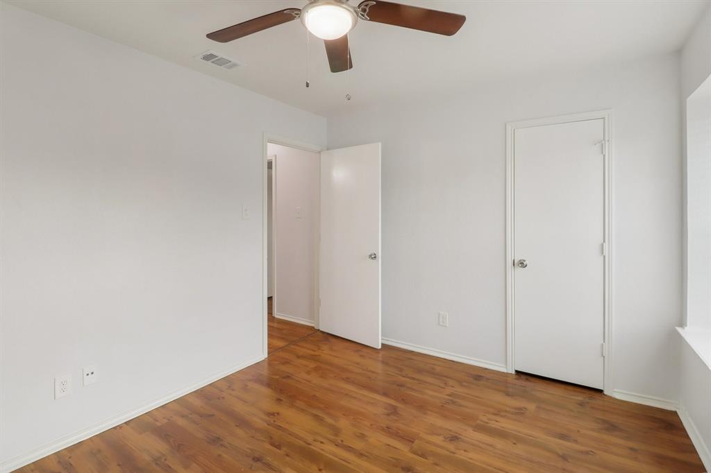 413 Chimney Rock Road Everman, TX 76140 - Photo 18 of 25 wooden floor in an empty room