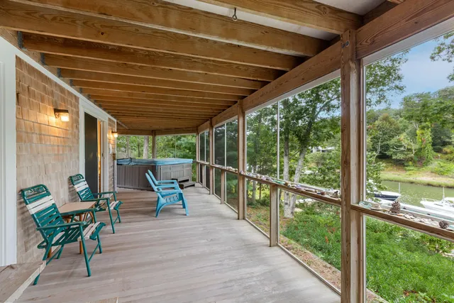 a view of deck with furniture and wooden floor