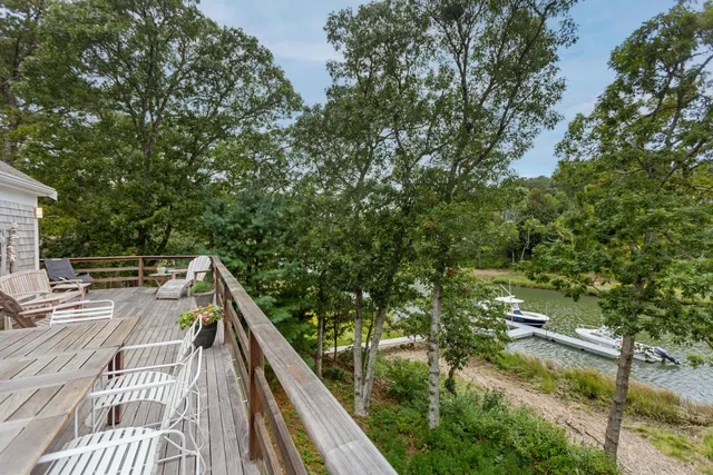 a view of balcony and yard