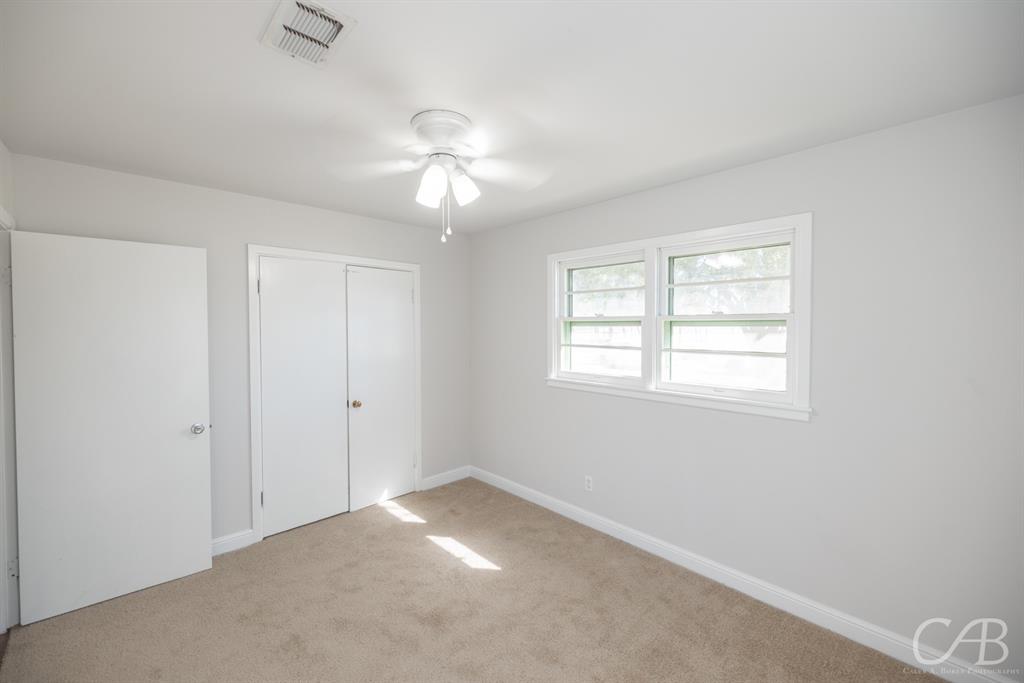872 Forrest Avenue Abilene, TX 79603 - Photo 6 of 21 a view of an empty room with a window