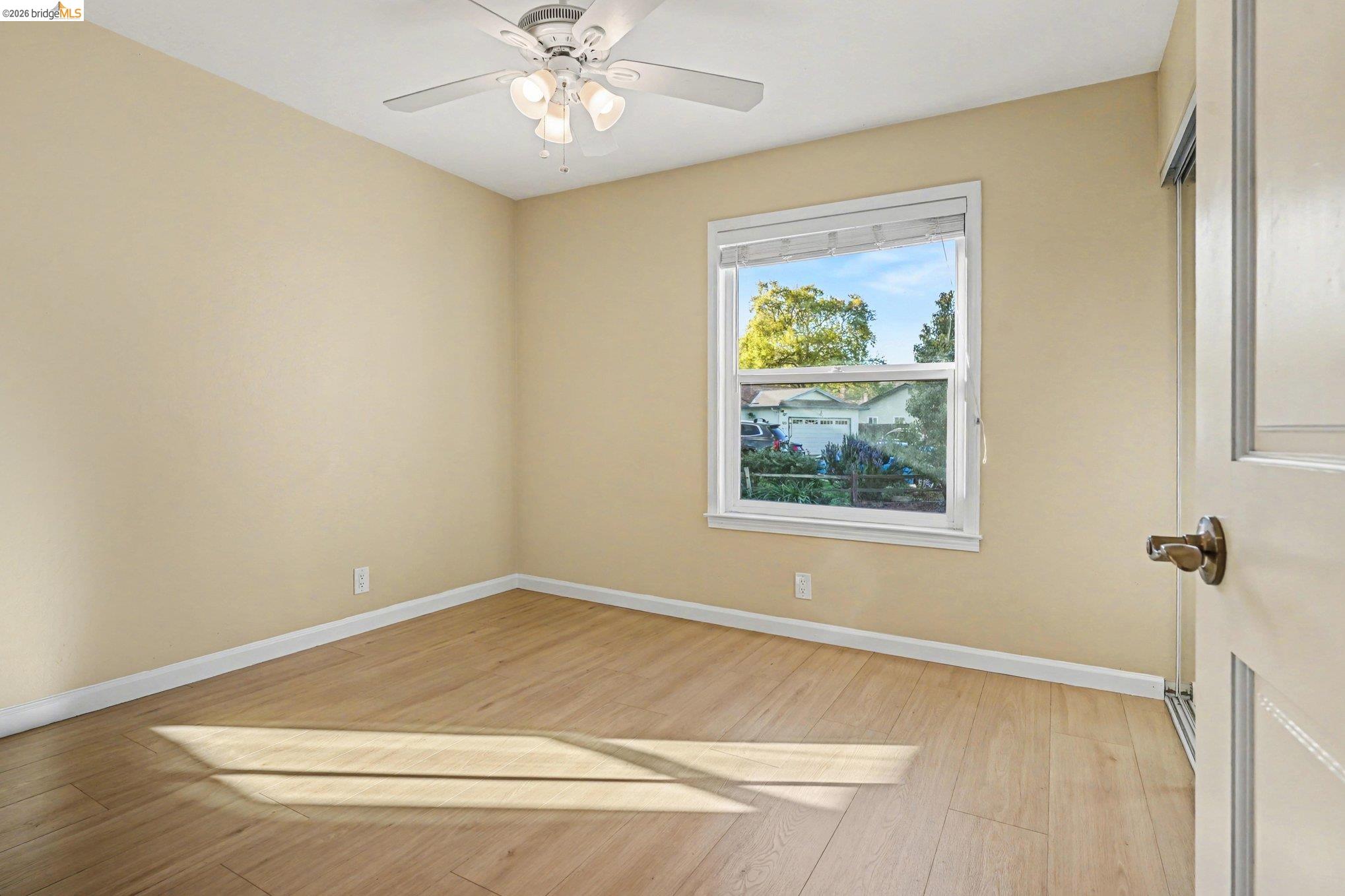 25 Marilyn Place San Ramon, CA 94583 - Photo 12 of 24 a view of a big room with wooden floor and windows in a room