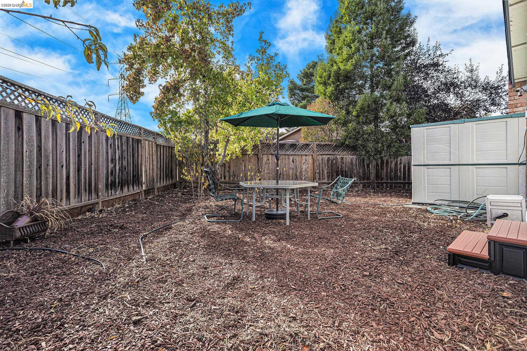 25 Marilyn Place San Ramon, CA 94583 - Photo 17 of 24 a backyard of a house with table and chairs