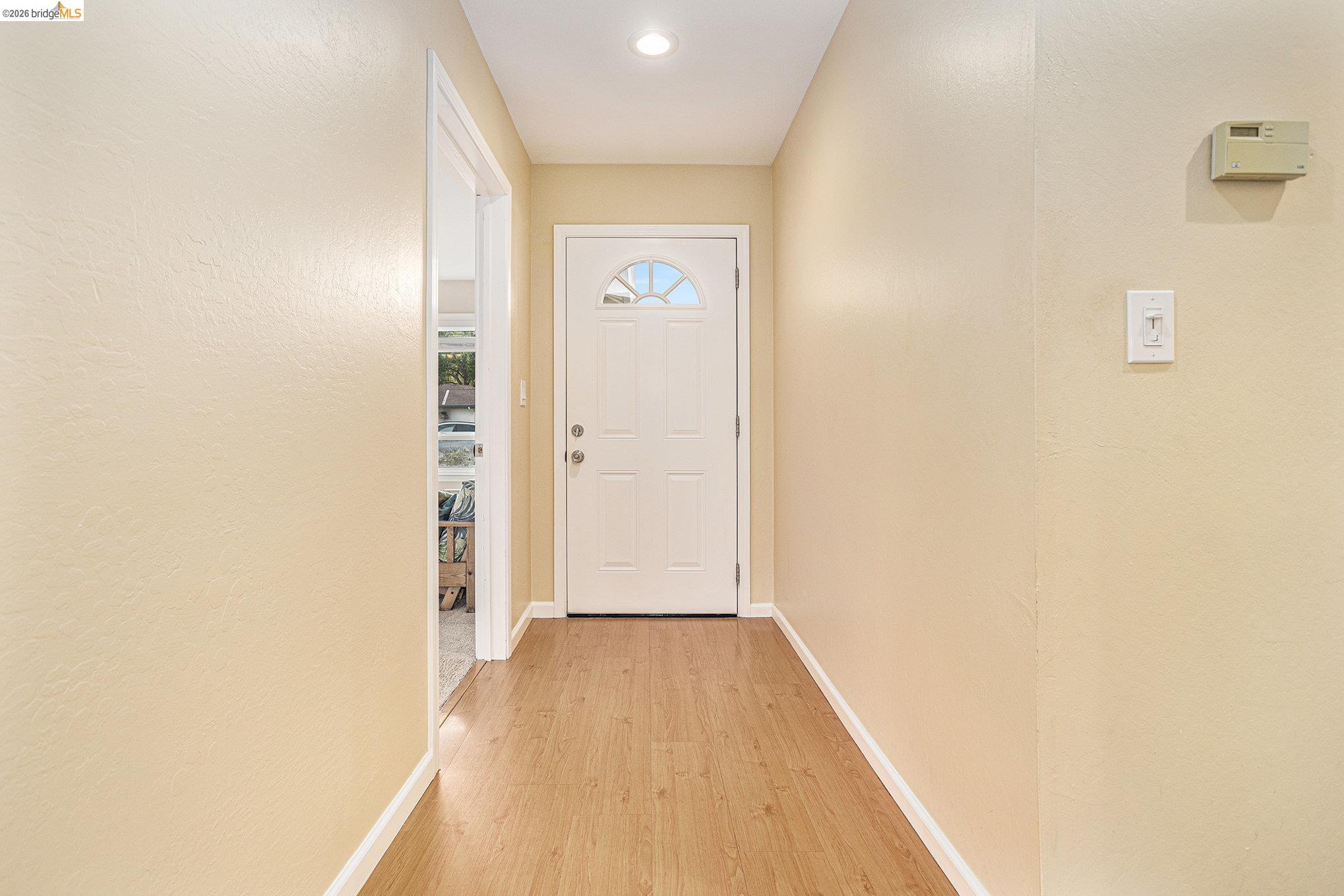 25 Marilyn Place San Ramon, CA 94583 - Photo 2 of 24 a view of a hallway with wooden floor