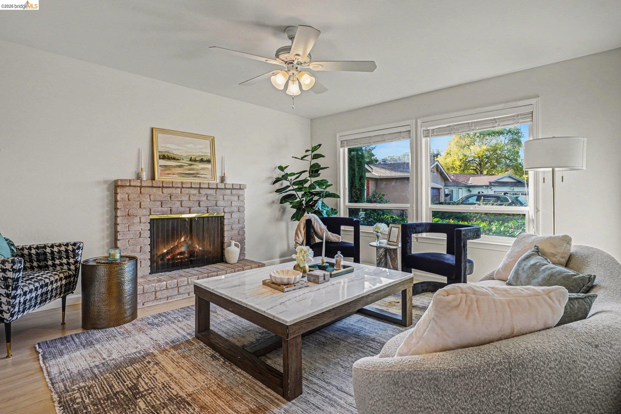 25 Marilyn Place San Ramon, CA 94583 - Photo 3 of 24 a living room with furniture and a fireplace