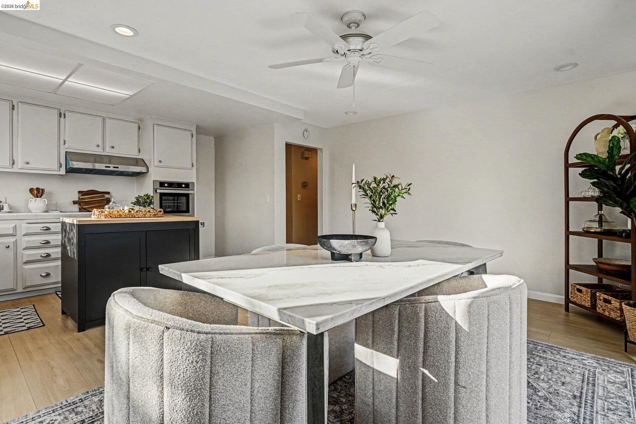 25 Marilyn Place San Ramon, CA 94583 - Photo 7 of 24 a view of kitchen with sink refrigerator dining table and chairs