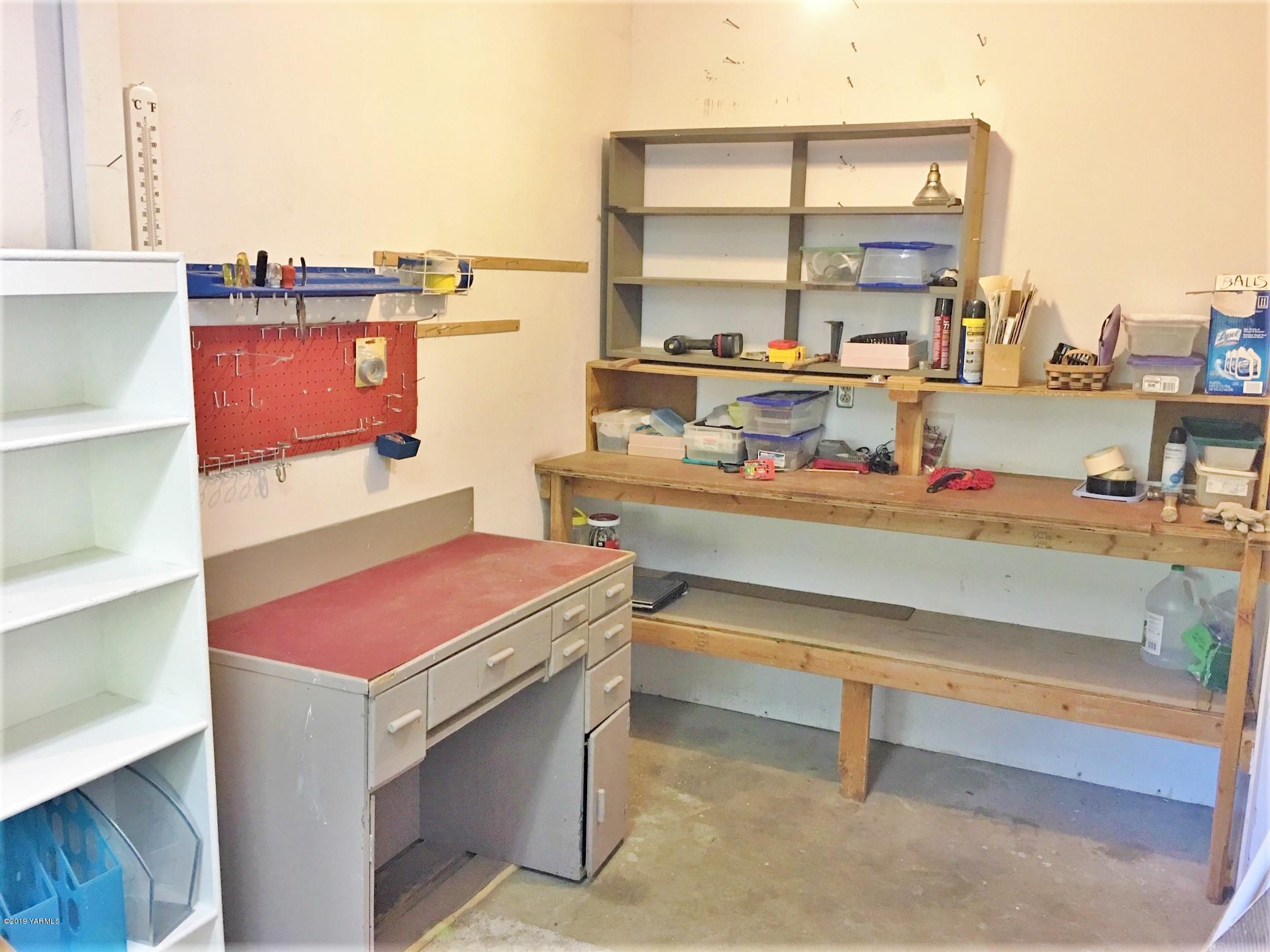 1220 Swan Road Sunnyside, WA 98944 - Photo 15 of 22 a room with storage and utility