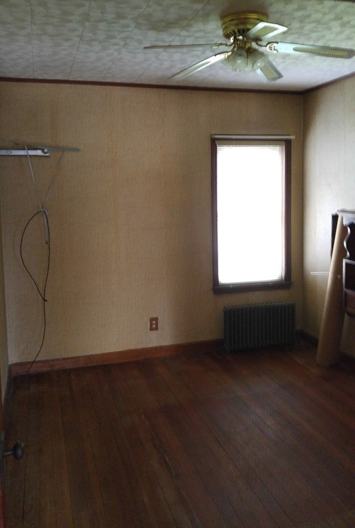 315 Mott Street Fall River, MA 02721 - Photo 13 of 20 a view of an empty room with a window
