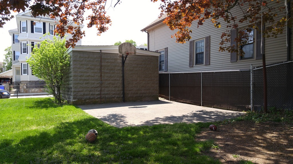 315 Mott Street Fall River, MA 02721 - Photo 8 of 20 a backyard of a house with lots of green space