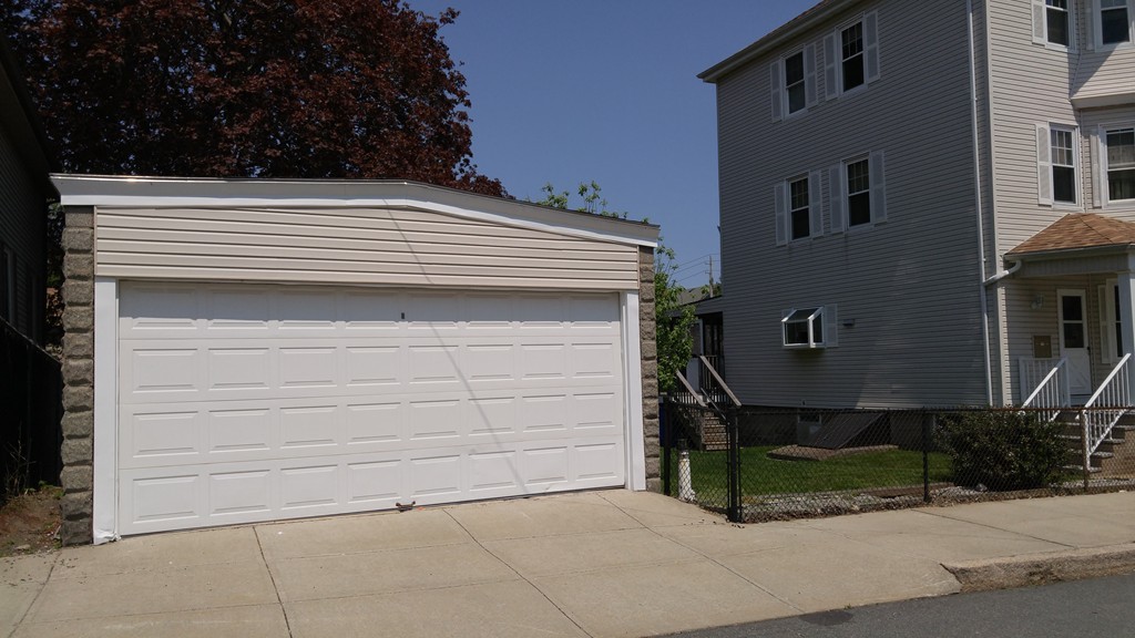 315 Mott Street Fall River, MA 02721 - Photo 10 of 20 a front view of a house with garage
