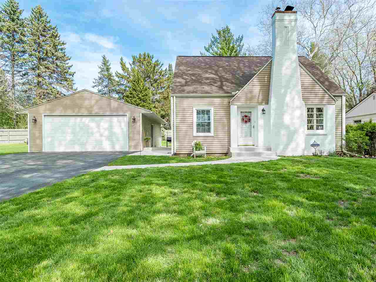 4323 Pinecrest Road Rockford, IL 61107 - Photo 1 of 21 a front view of house with yard and green space