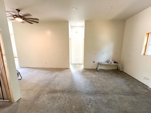 wooden floor and windows in an empty room