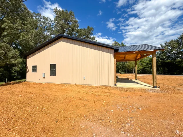 a view of backyard of a house