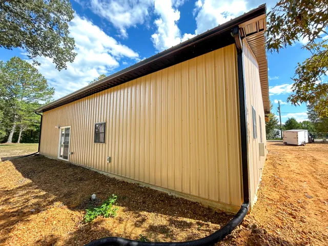 a view of a back yard of the house