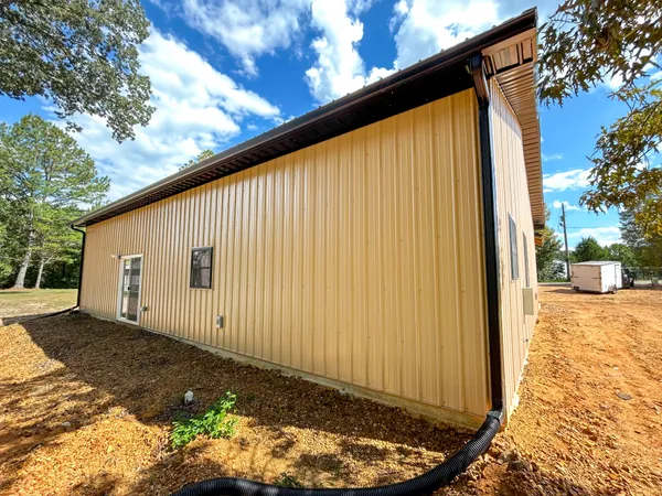a view of a back yard of the house
