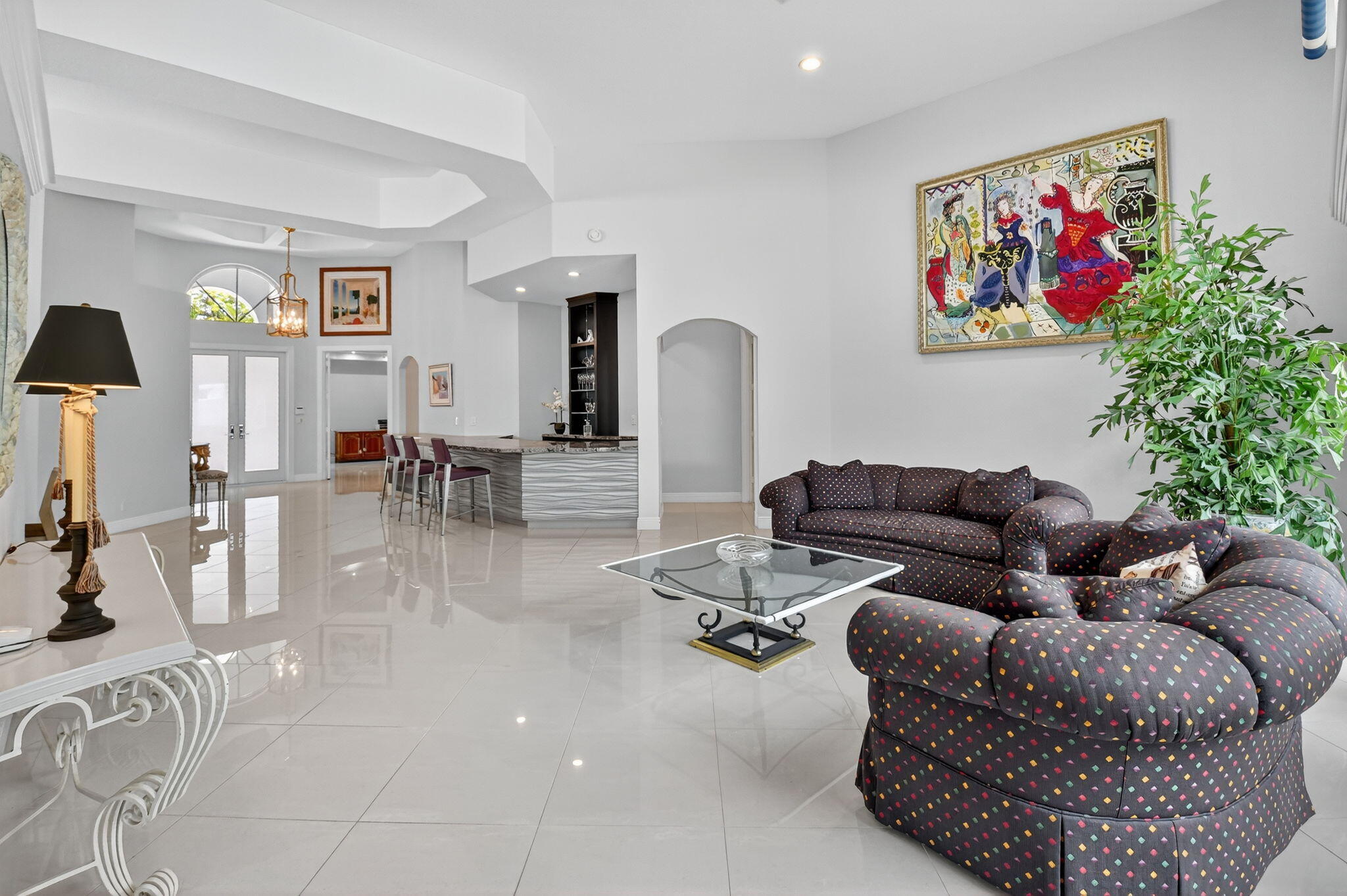 6535 Somerset Circle Boca Raton, FL 33496 - Photo 11 of 59 a living room with furniture potted plant and a painting on the wall
