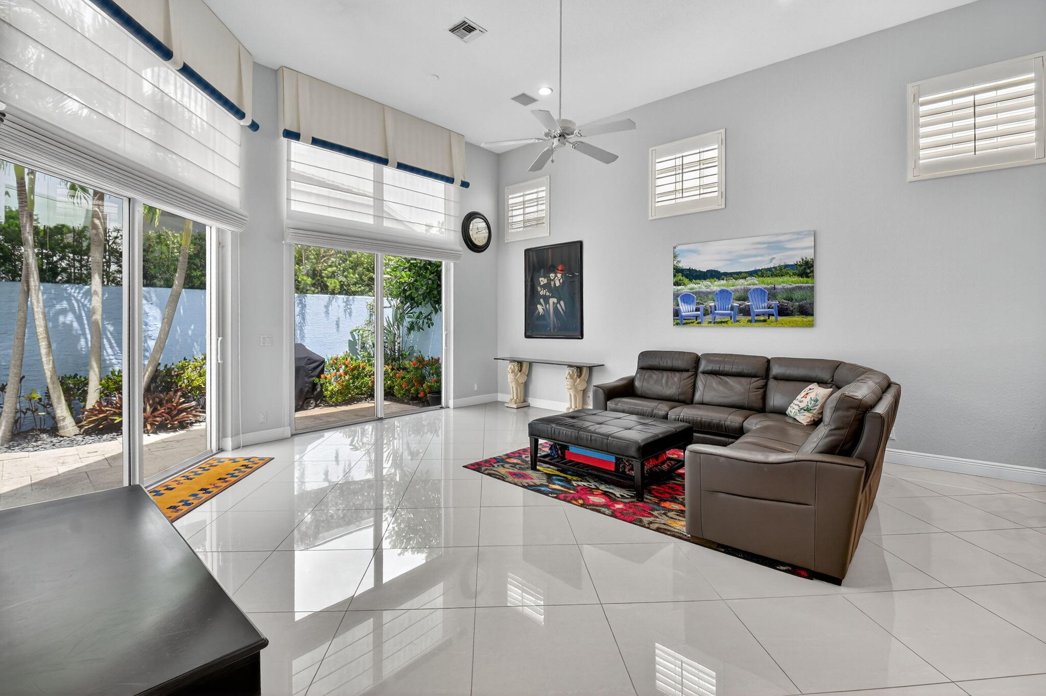 6535 Somerset Circle Boca Raton, FL 33496 - Photo 13 of 59 a living room with furniture and a large window