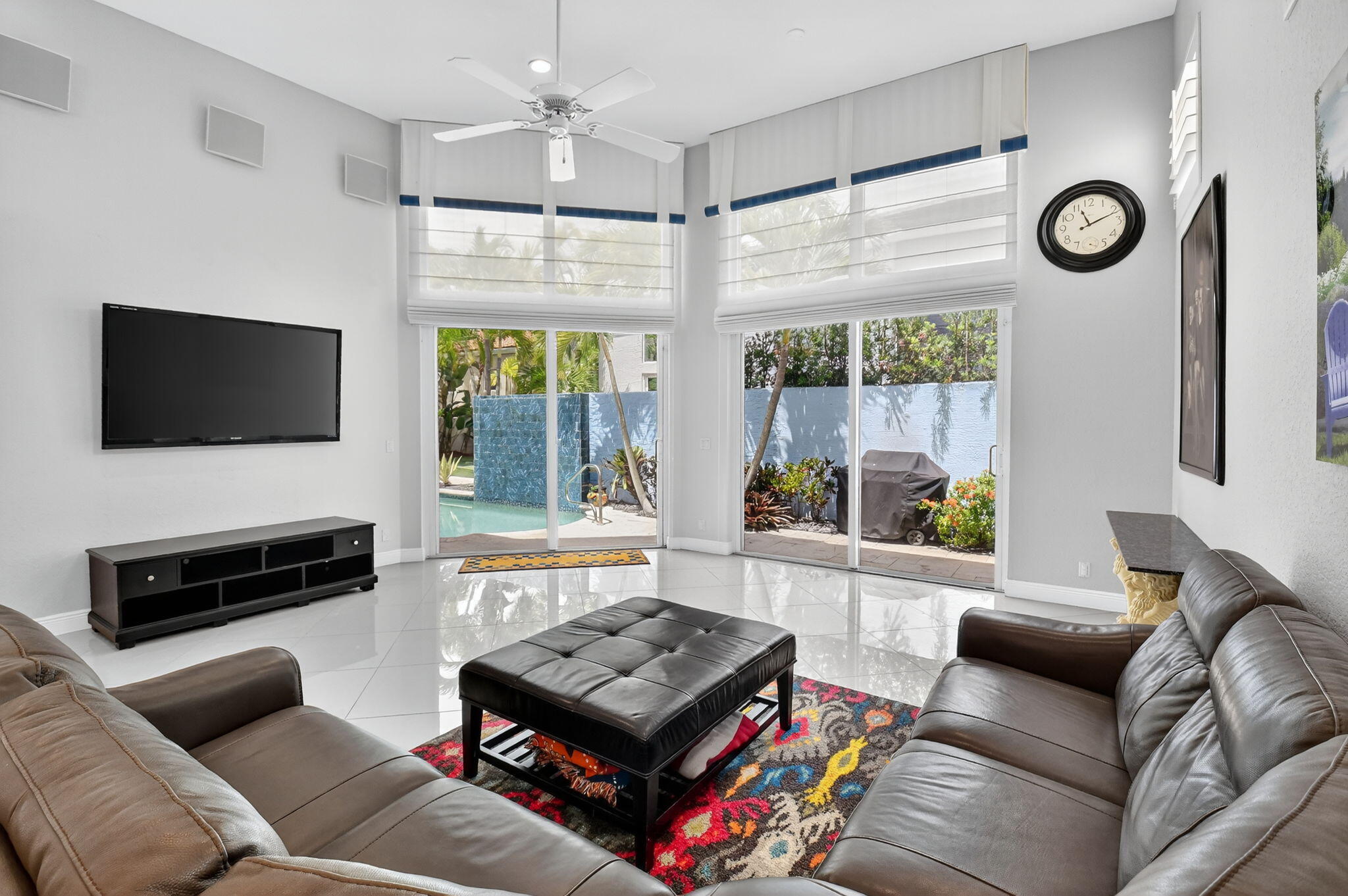 6535 Somerset Circle Boca Raton, FL 33496 - Photo 14 of 59 a living room with furniture and a flat screen tv