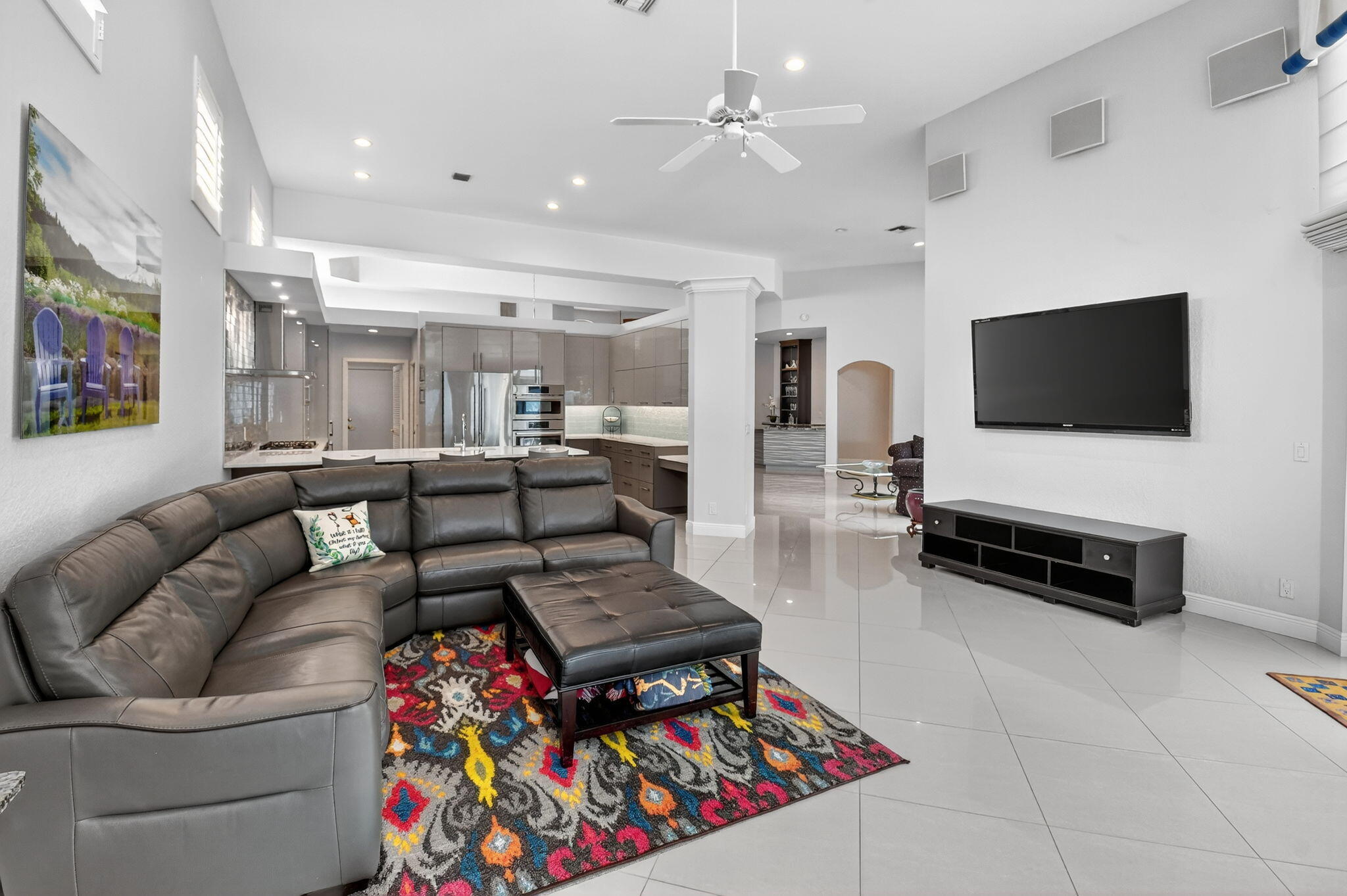 6535 Somerset Circle Boca Raton, FL 33496 - Photo 15 of 59 a living room with furniture and a flat screen tv