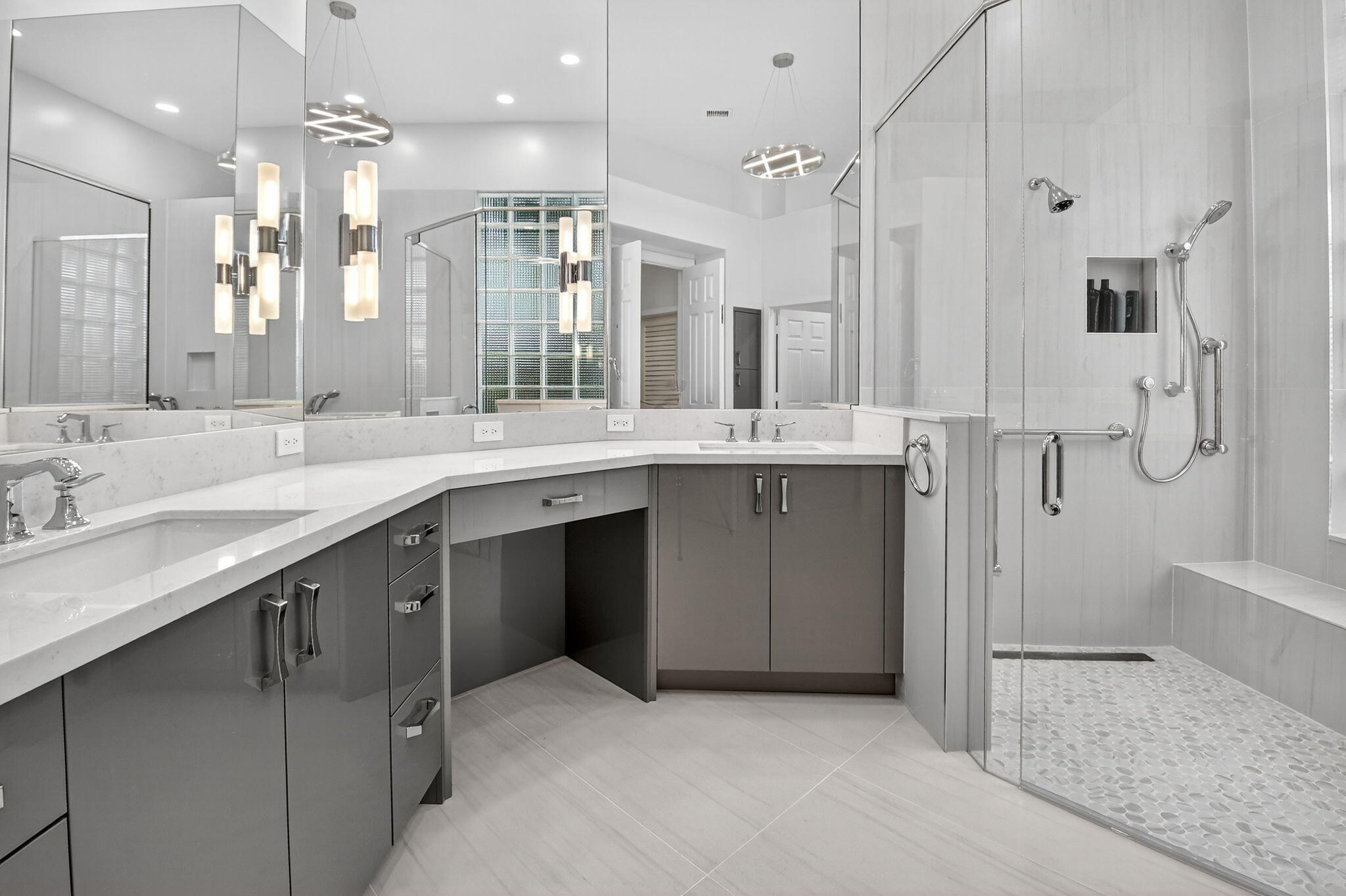 6535 Somerset Circle Boca Raton, FL 33496 - Photo 32 of 59 a large kitchen with a sink and a large mirror