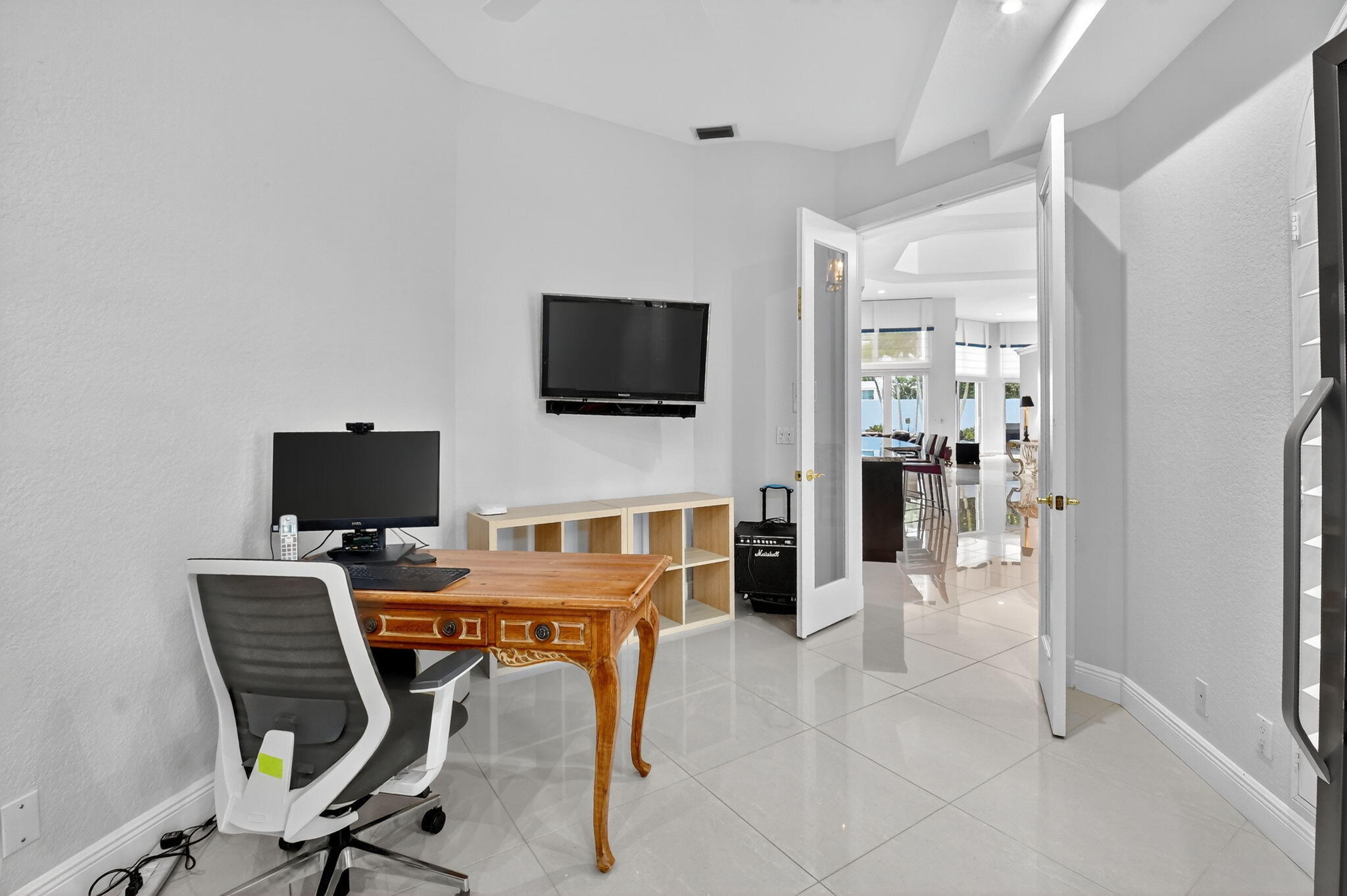 6535 Somerset Circle Boca Raton, FL 33496 - Photo 37 of 59 a view of a livingroom with workspace and a window