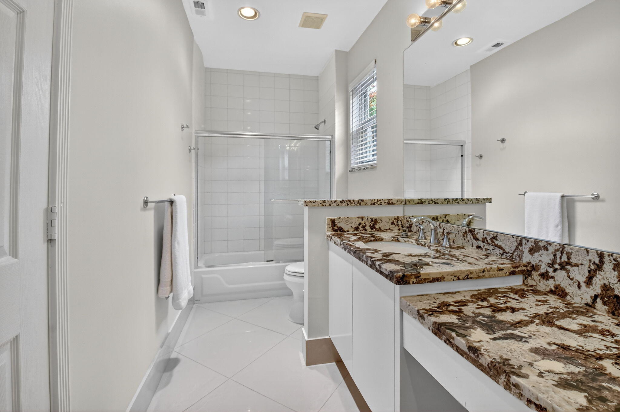 6535 Somerset Circle Boca Raton, FL 33496 - Photo 42 of 59 a kitchen with a stove and a refrigerator