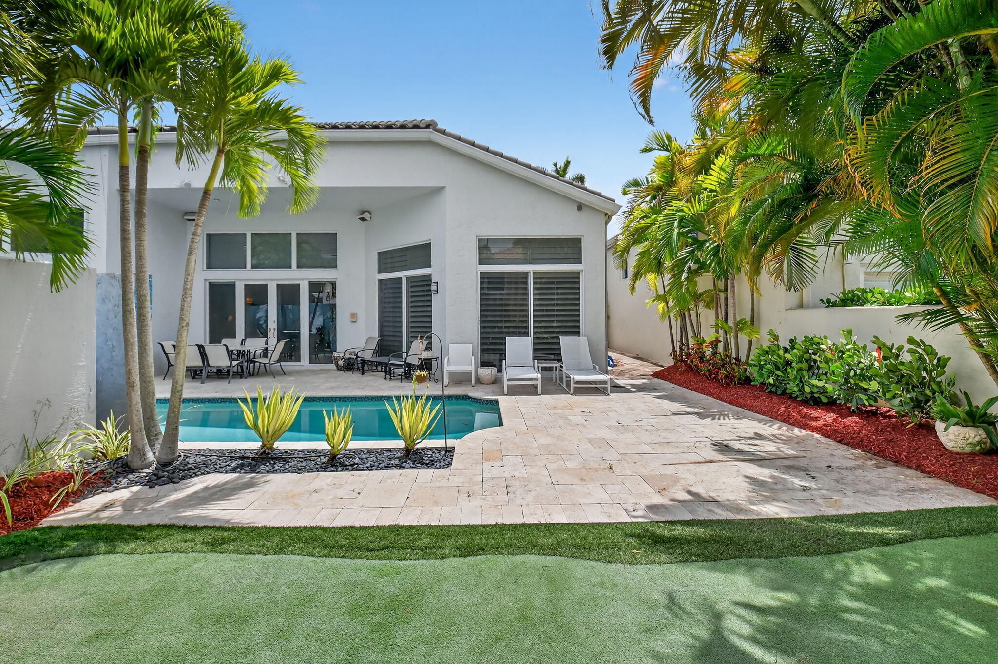6535 Somerset Circle Boca Raton, FL 33496 - Photo 52 of 59 a view of house with swimming pool and garden