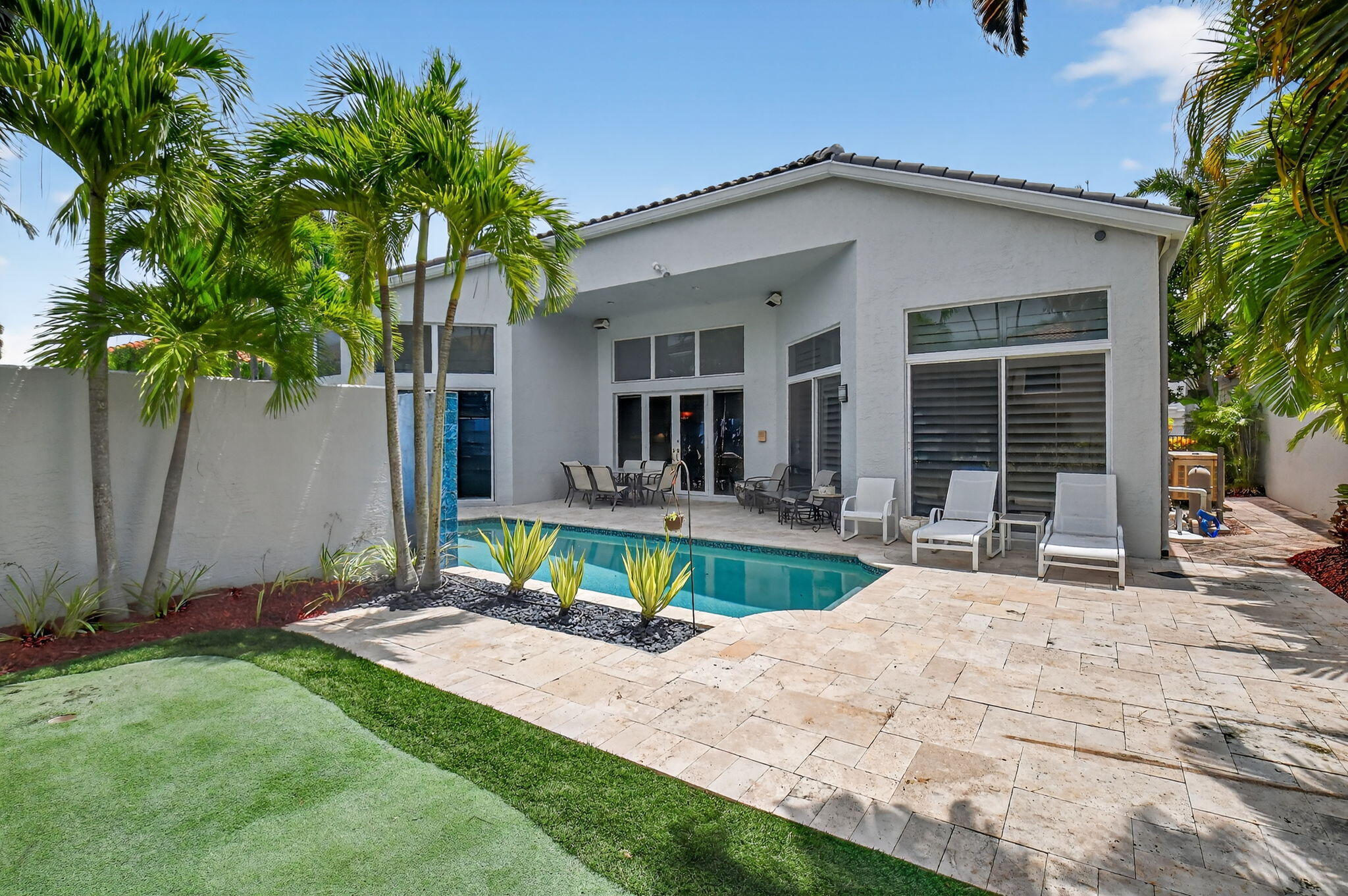6535 Somerset Circle Boca Raton, FL 33496 - Photo 53 of 59 a view of a house with pool and sitting area