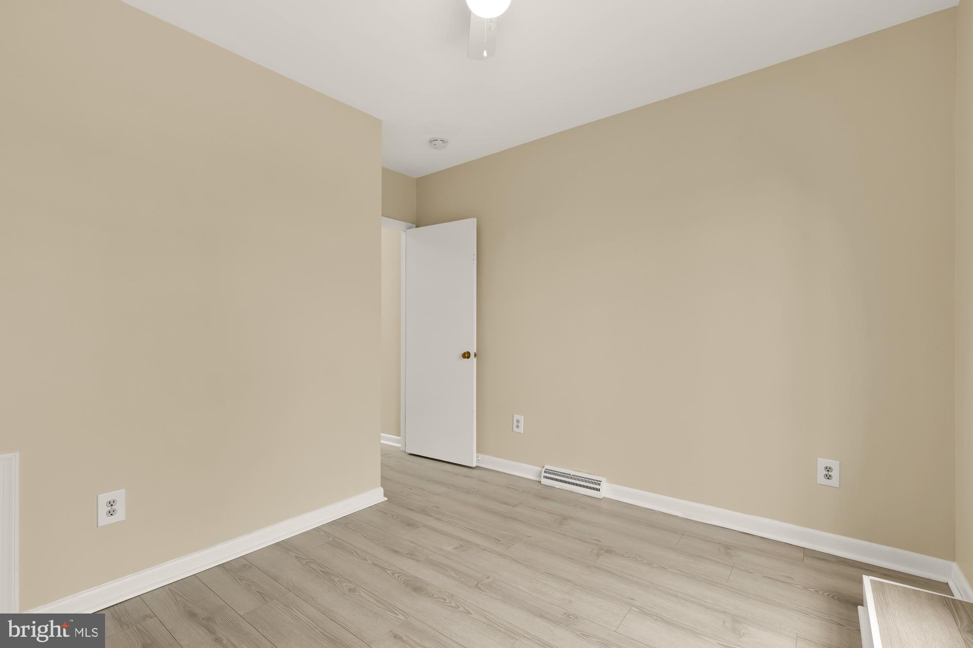 650 E Street Northeast, Unit A Washington, DC 20002 - Photo 20 of 31 a view of an empty room with wooden floor