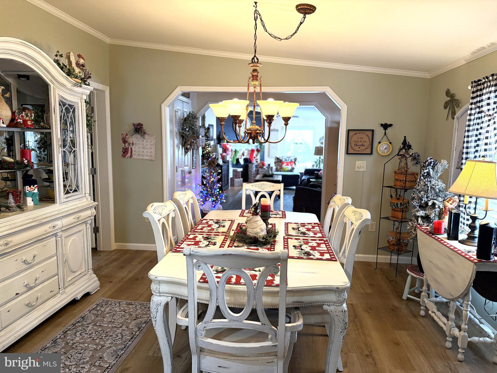 133 Ridgewood Manor Manheim, PA 17545 - Photo 17 of 38 a dining room with furniture a chandelier and wooden floor
