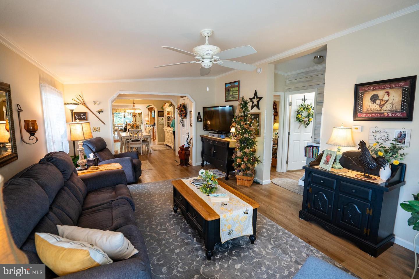 133 Ridgewood Manor Manheim, PA 17545 - Photo 23 of 38 a living room with furniture and a chandelier