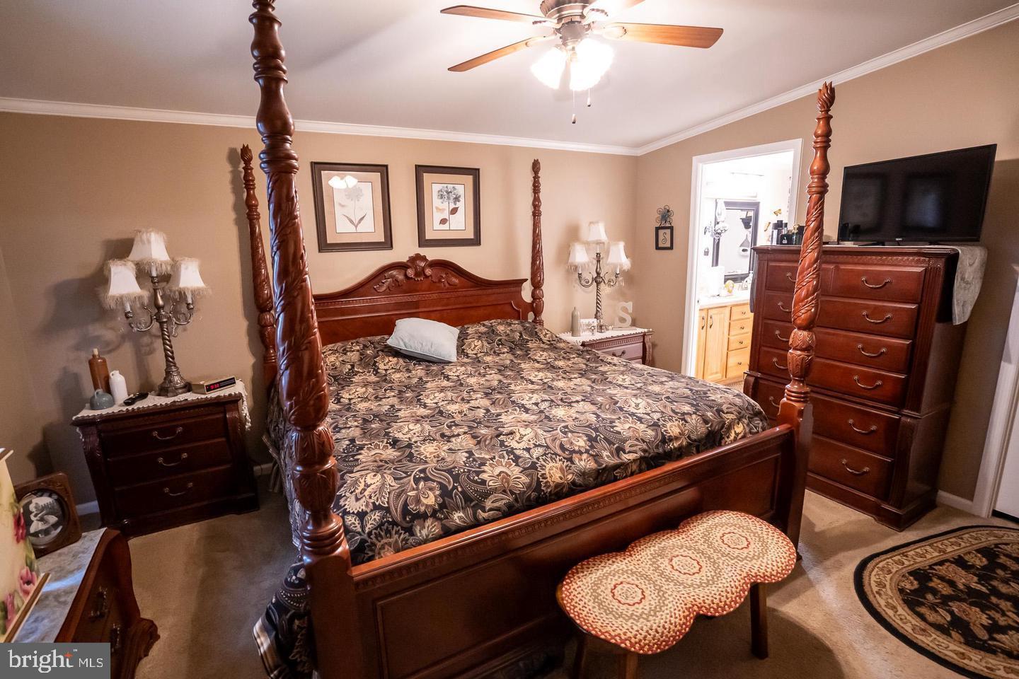 133 Ridgewood Manor Manheim, PA 17545 - Photo 34 of 38 a bedroom with a bed and dresser