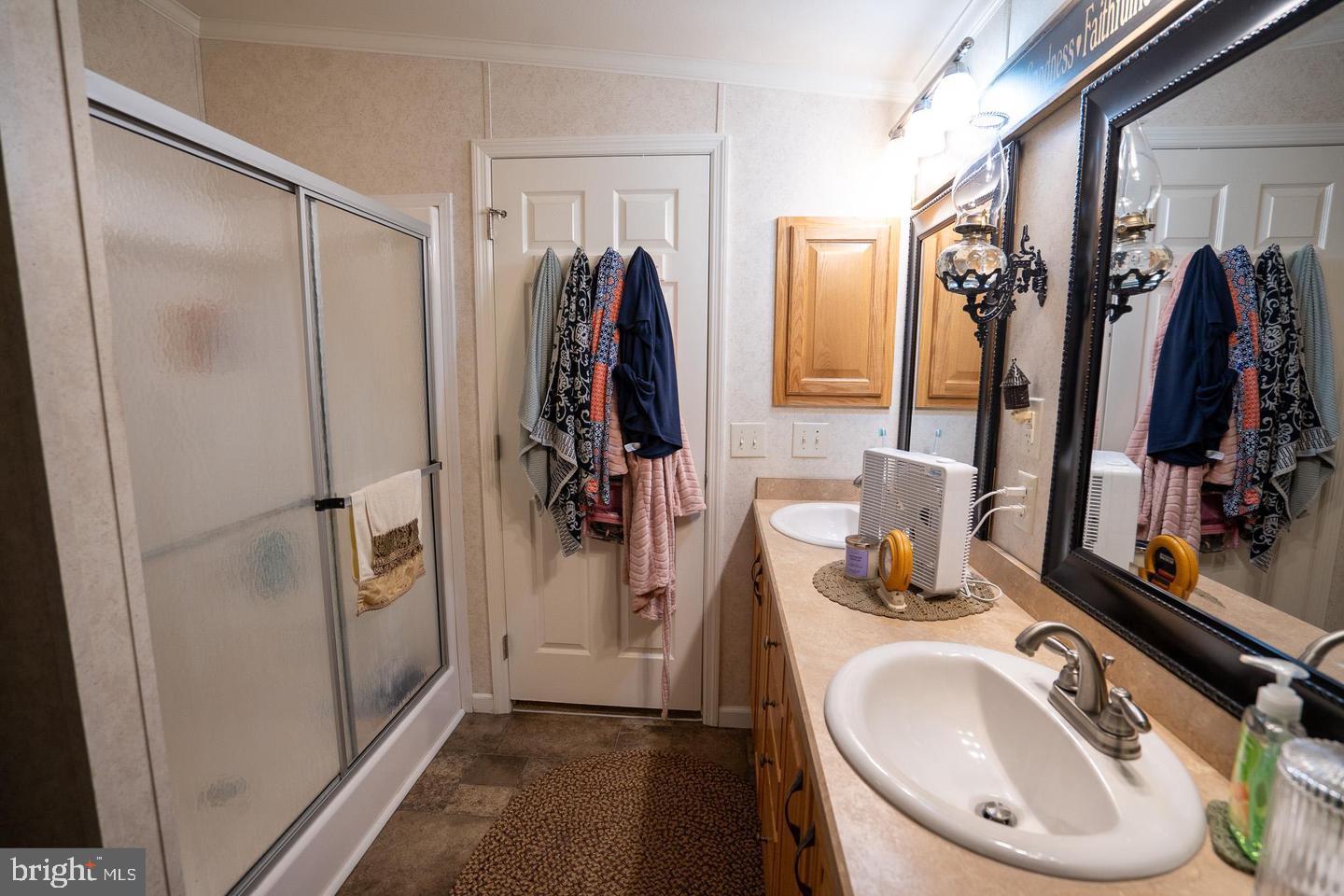 133 Ridgewood Manor Manheim, PA 17545 - Photo 38 of 38 a bathroom with a sink a toilet and a mirror