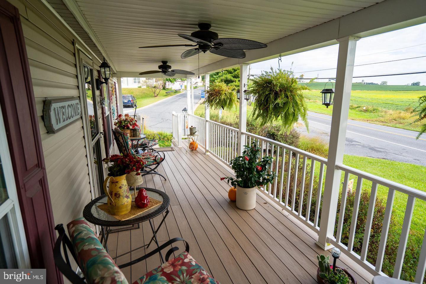 133 Ridgewood Manor Manheim, PA 17545 - Photo 7 of 38 a view of a balcony with chairs and a potted plant