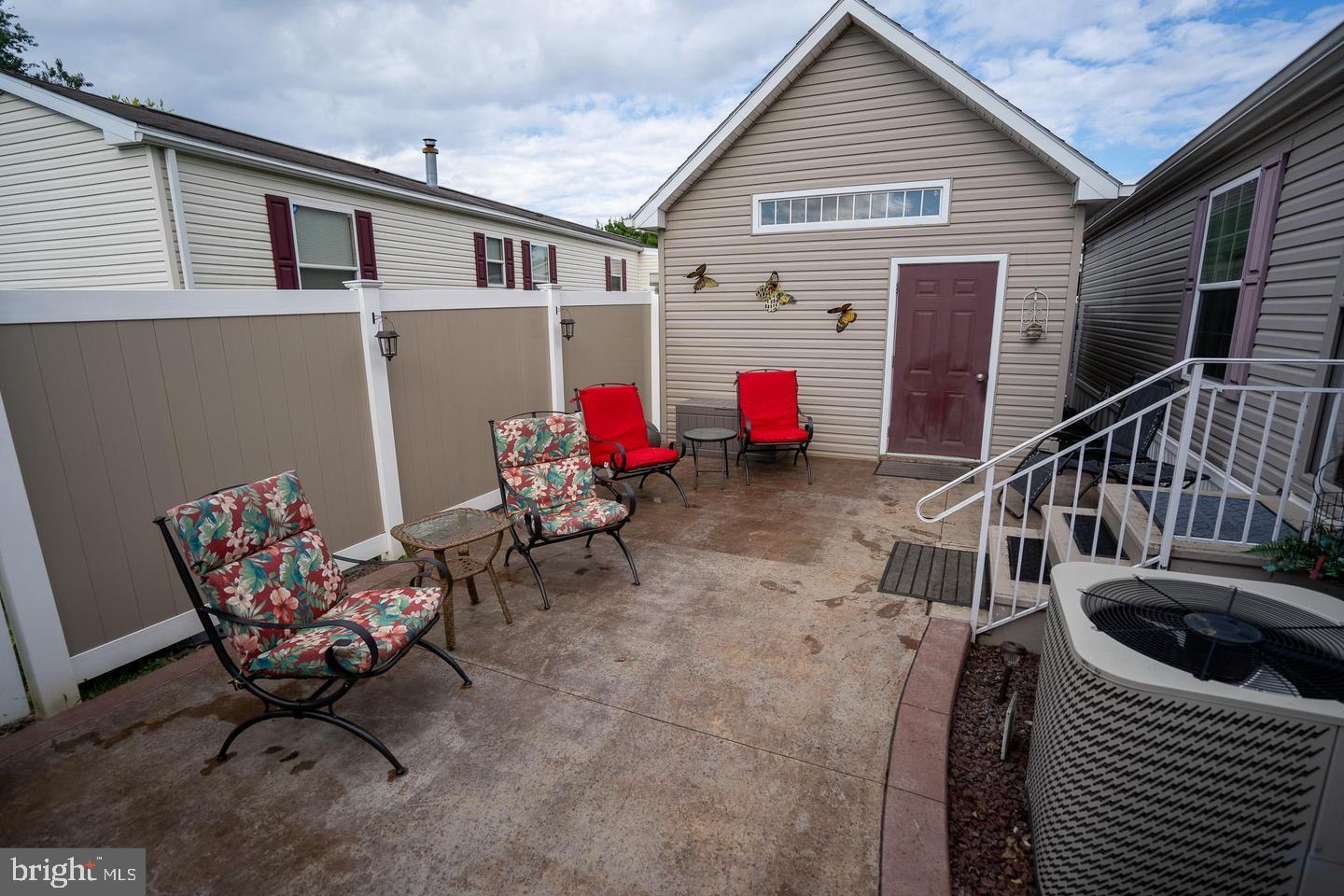 133 Ridgewood Manor Manheim, PA 17545 - Photo 10 of 38 a view of a house with backyard and sitting area