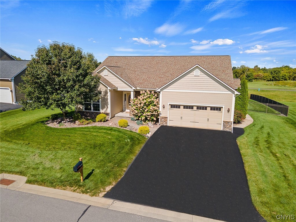 Welcoming Craftsman Ranch home accented with Stone