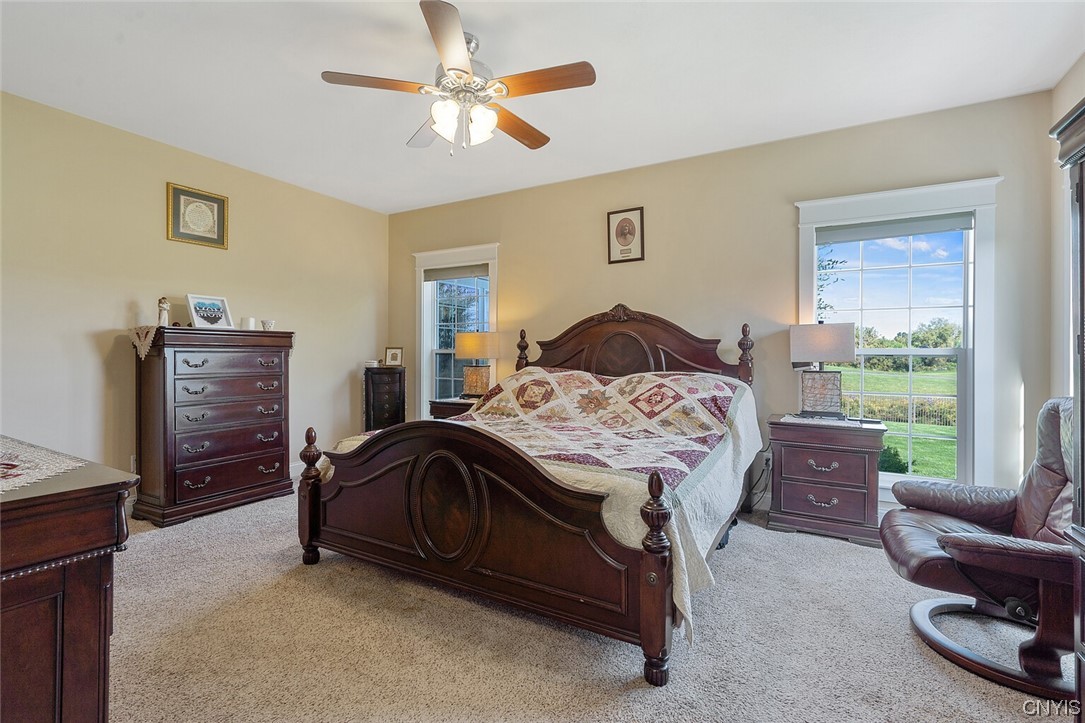 3443 Long Shadow Drive Lysander, NY 13027 - Photo 13 of 49 The primary suite has wonderful views of the golf