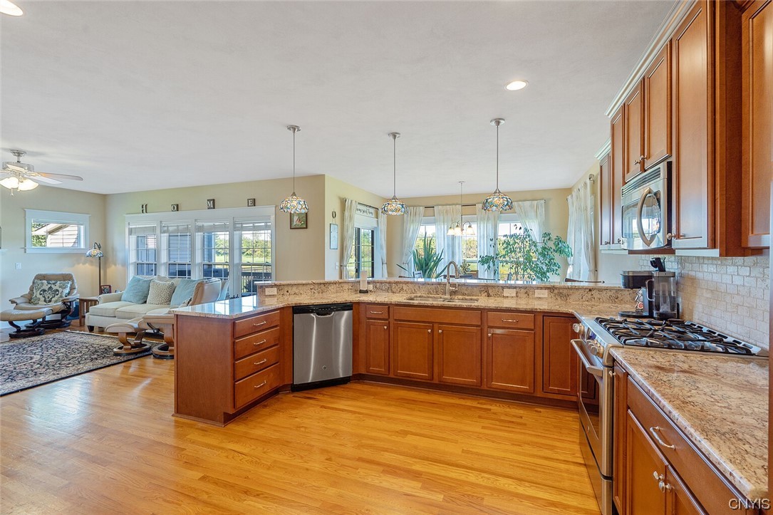 3443 Long Shadow Drive Lysander, NY 13027 - Photo 17 of 49 Large kitchen with plenty of space to entertain