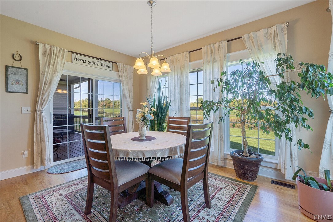 3443 Long Shadow Drive Lysander, NY 13027 - Photo 22 of 49 Plenty of room and views with glass sliders leadin