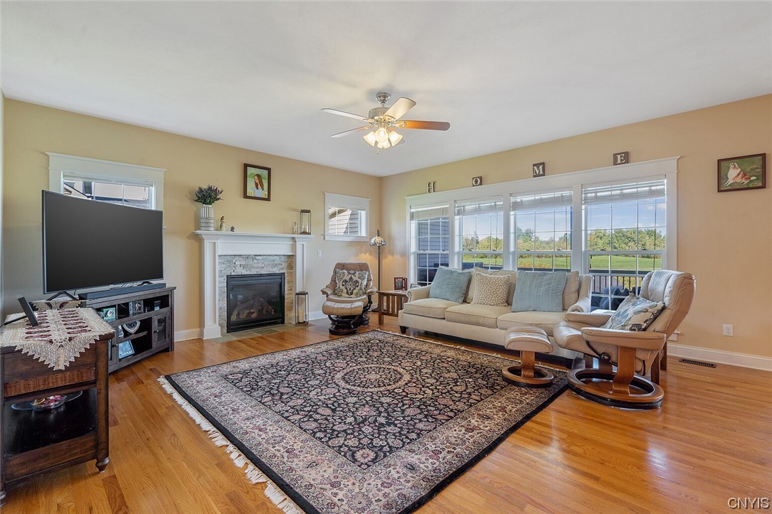 3443 Long Shadow Drive Lysander, NY 13027 - Photo 27 of 49 9 foot tall ceilings and wall of windows enhance t