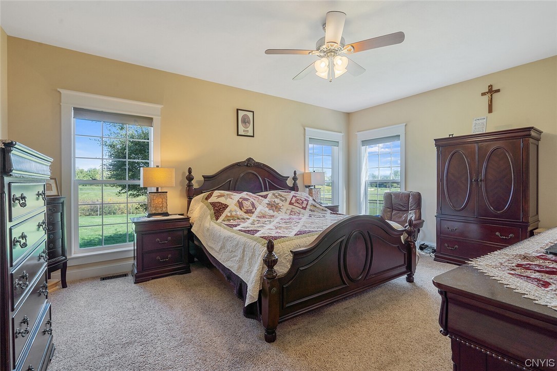 3443 Long Shadow Drive Lysander, NY 13027 - Photo 32 of 49 Large primary bedroom with ensuite bathroom with l