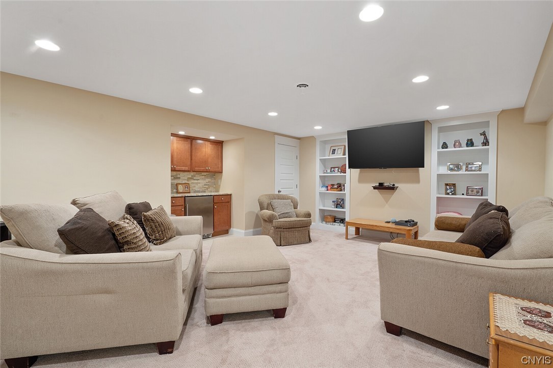 3443 Long Shadow Drive Lysander, NY 13027 - Photo 44 of 49 The lower level was professionally done and has a