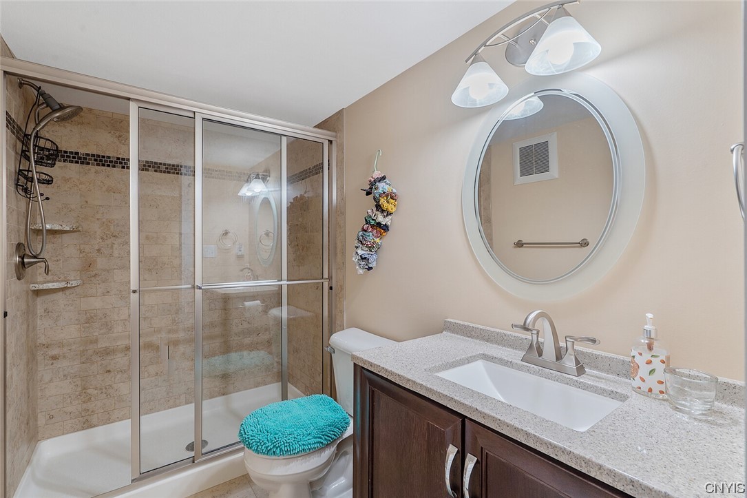 3443 Long Shadow Drive Lysander, NY 13027 - Photo 47 of 49 3rd full bathroom on the lower level has new vanit