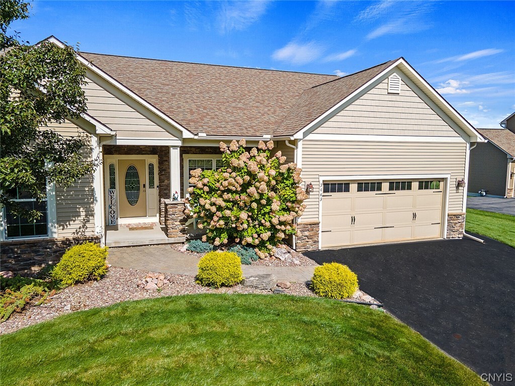 3443 Long Shadow Drive Lysander, NY 13027 - Photo 5 of 49 Show stopper curb appeal with paver walkway and la