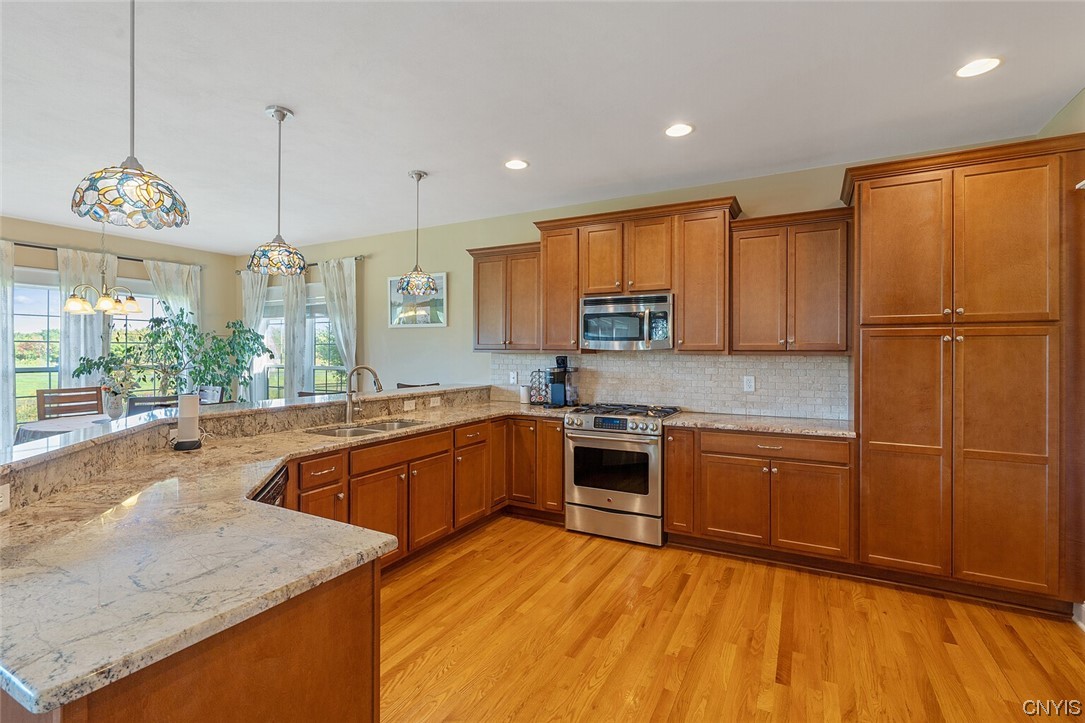 3443 Long Shadow Drive Lysander, NY 13027 - Photo 6 of 49 Beautiful granite throughout