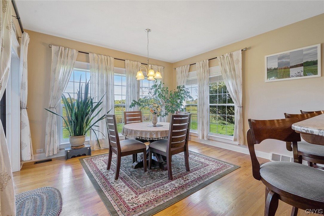3443 Long Shadow Drive Lysander, NY 13027 - Photo 8 of 49 Lovely dining area with large windows and fantasti