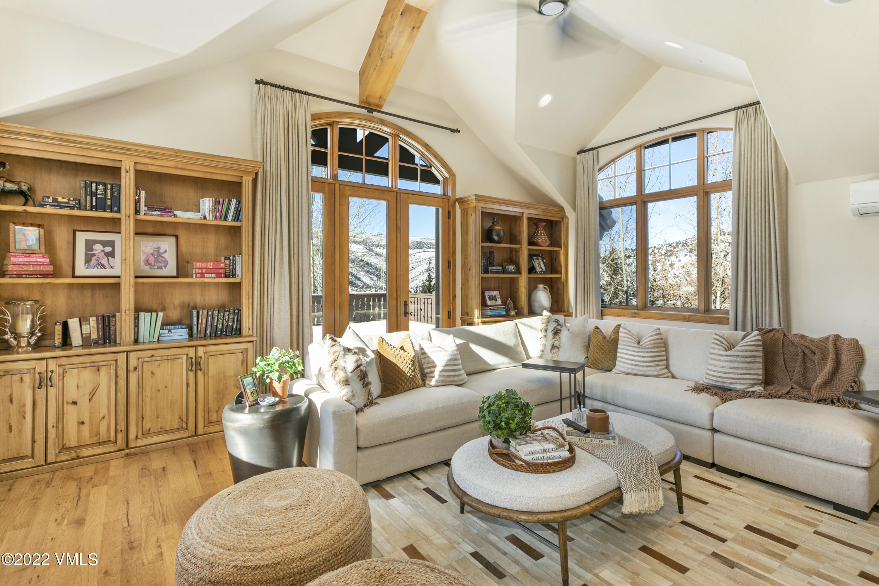 875 Cordillera Way Edwards, CO 81632 - Photo 17 of 57 a living room with furniture and a large window