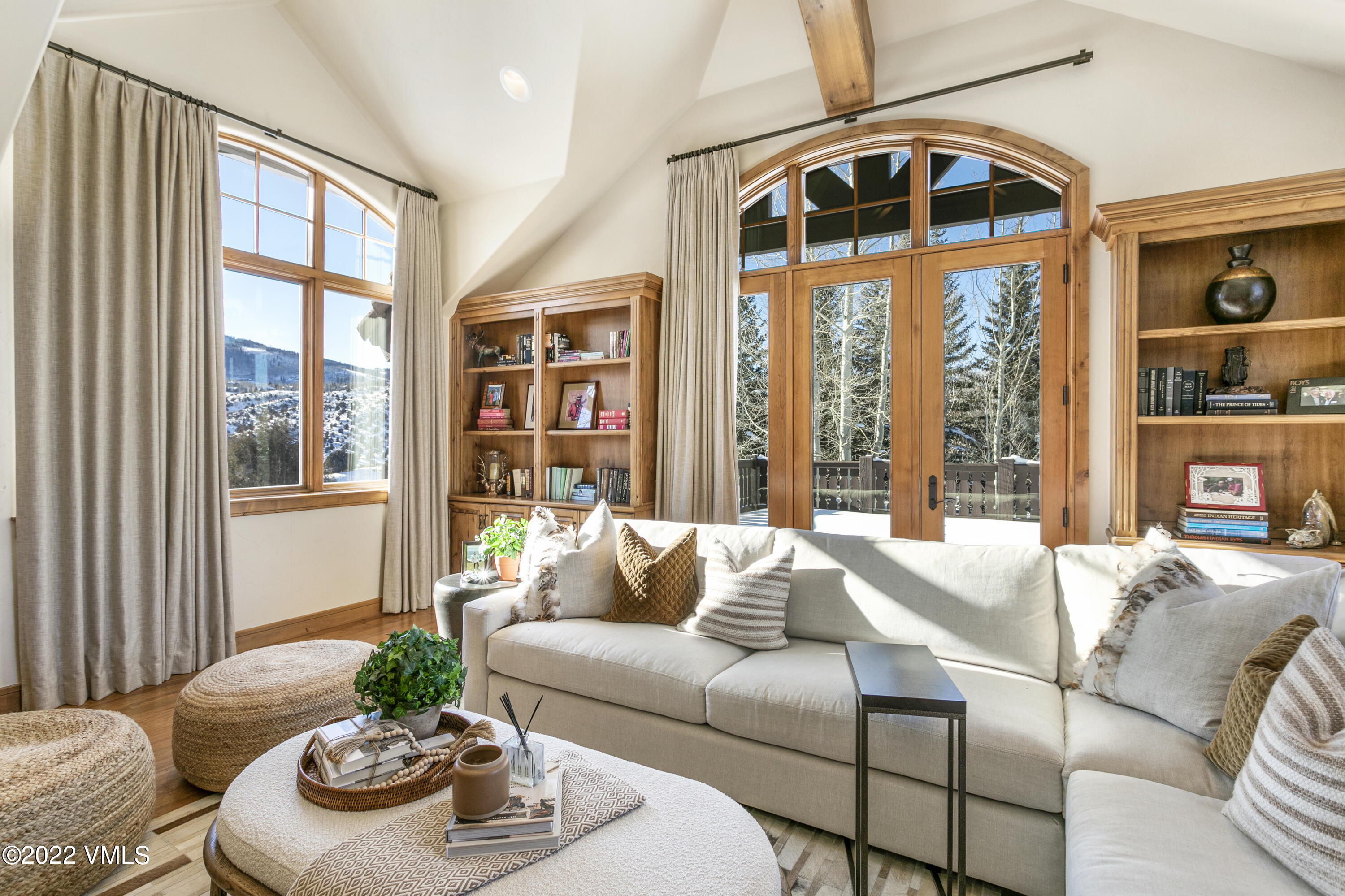875 Cordillera Way Edwards, CO 81632 - Photo 19 of 57 a living room with furniture and a large window