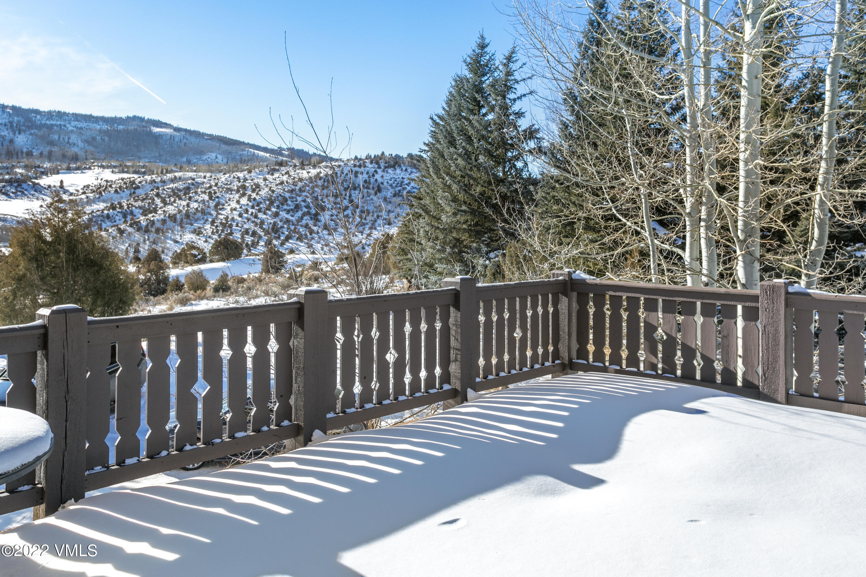 875 Cordillera Way Edwards, CO 81632 - Photo 21 of 57 a view of a wooden street from a balcony