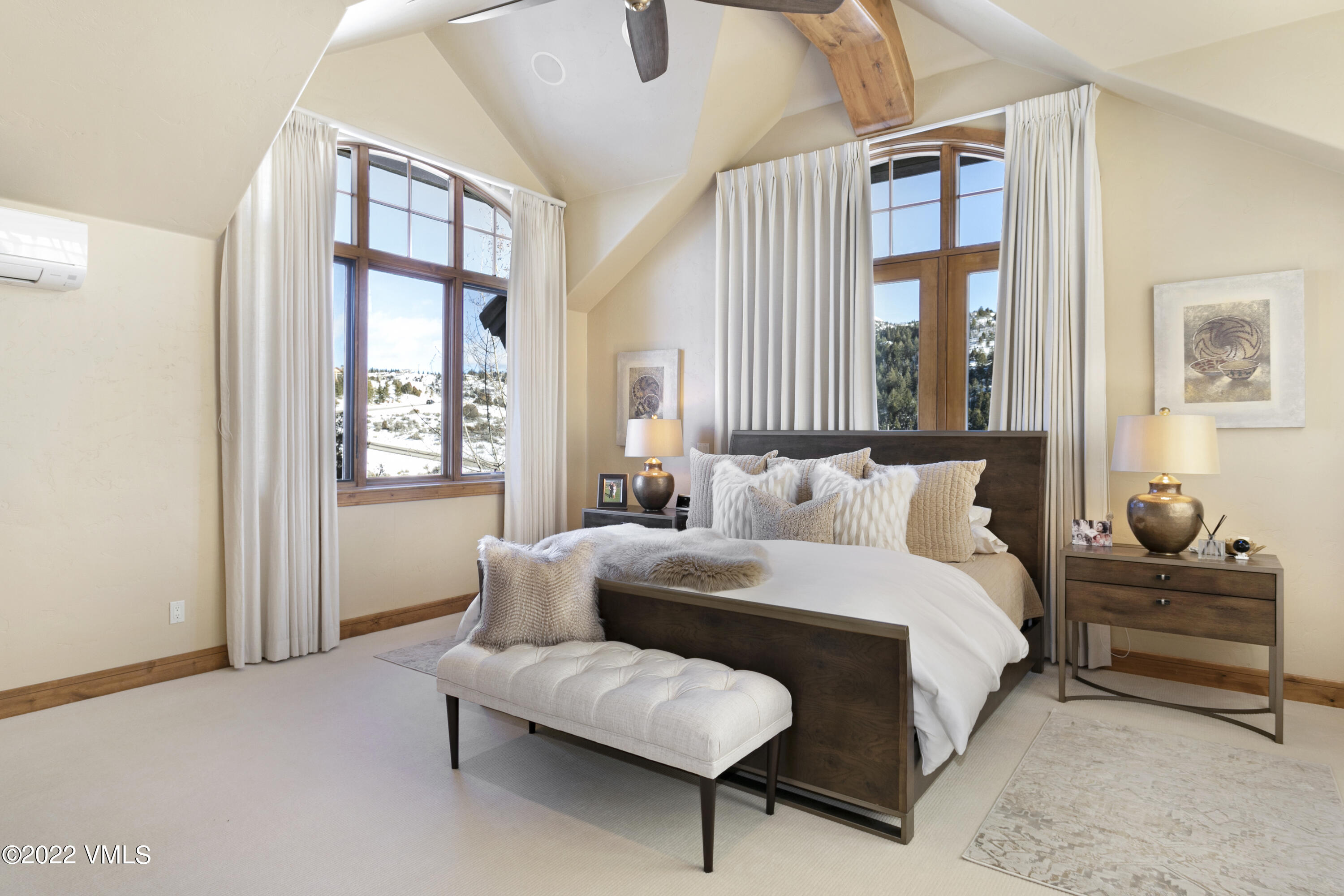 875 Cordillera Way Edwards, CO 81632 - Photo 23 of 57 a bedroom with a bed window and couch